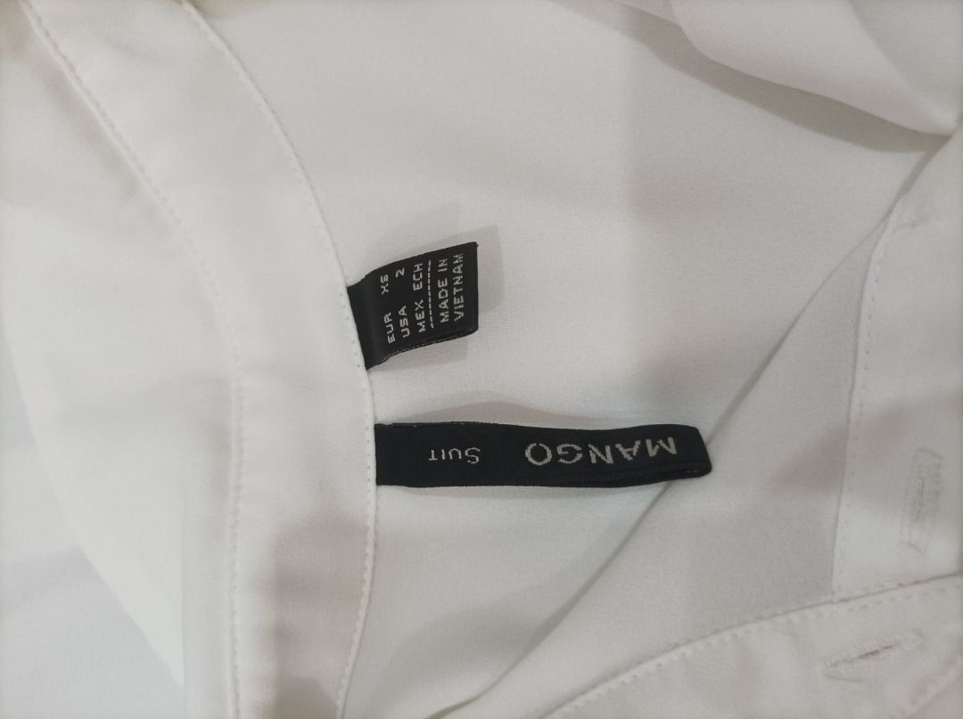 Mango Silk Button Down Blouse (Category: Blouses) located in Quezon City. Submitted by alxchng (Listing ID 1427990088, Image 3). Description: Pre loved Chest - 17inches Length - 25inches.
