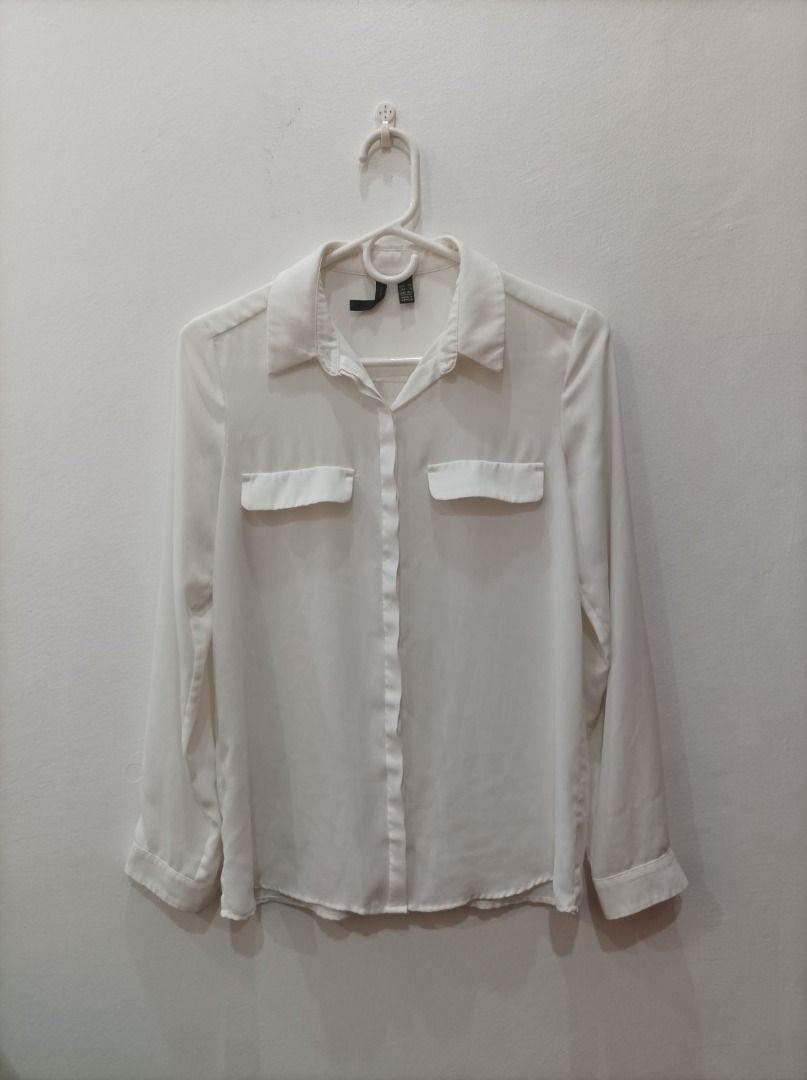Mango Silk Button Down Blouse (Category: Blouses) located in Quezon City. Submitted by alxchng (Listing ID 1427990088, Image 1). Description: Pre loved Chest - 17inches Length - 25inches.