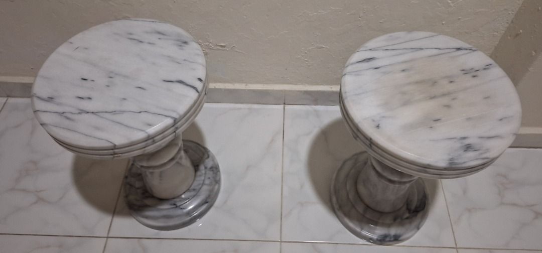 Marble Top Side Table (Category: Tables & Sets) located in Singapore. Submitted by tinklestar (Listing ID 1428052913, Image 2). Description: Elegant side table with a beautiful authentic carravagio marble top. Features a dark wood base with intricate carvings. Perfect for displaying decor or as a functional piece in any room. Also selling two matching marble top stools. Very cooling seats..