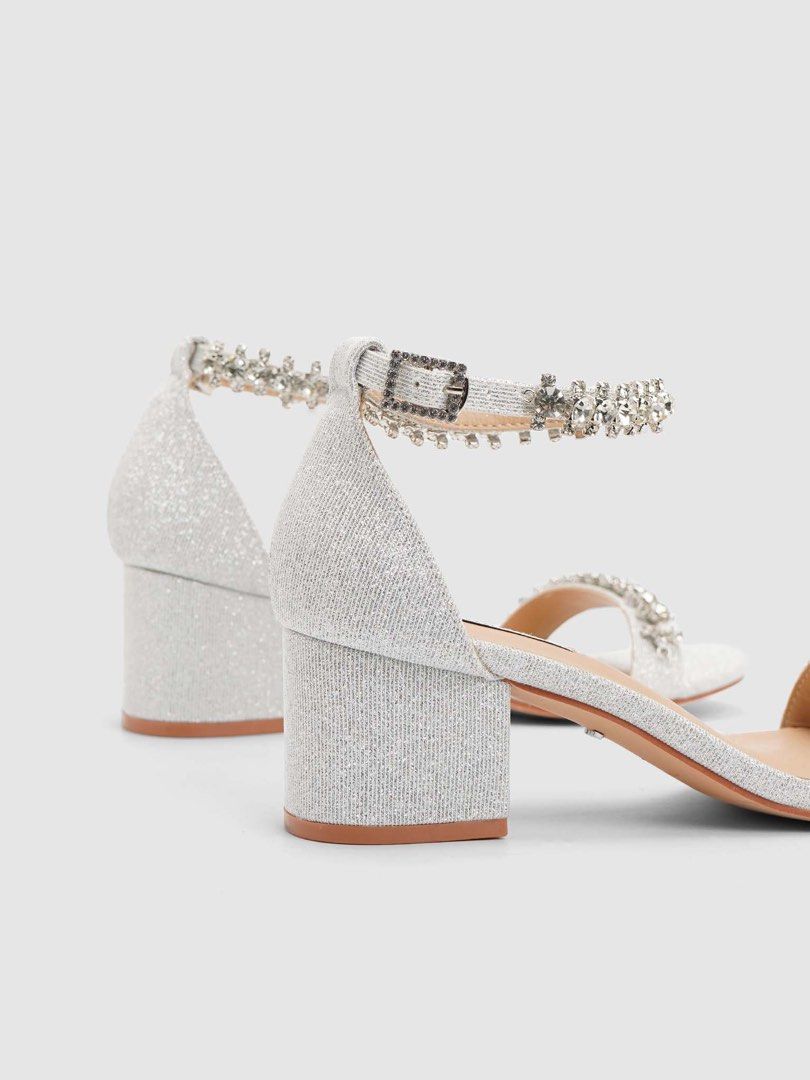 Matthews Embellished Block Heel Sandals (Category: Heels) located in Quezon City. Submitted by ceegeexx (Listing ID 1427960564, Image 3). Description: Matthews Bridal Shoes | ARIN 💎🤍 ✔️ Used once for ceremony only ✔️ Silver ✔️ Size 37 📸 Still looks perfect when worn ✨ No damage, only minimal footmarks (not visible when worn) Bought for ₱2000 ₱1100 (negotiable).