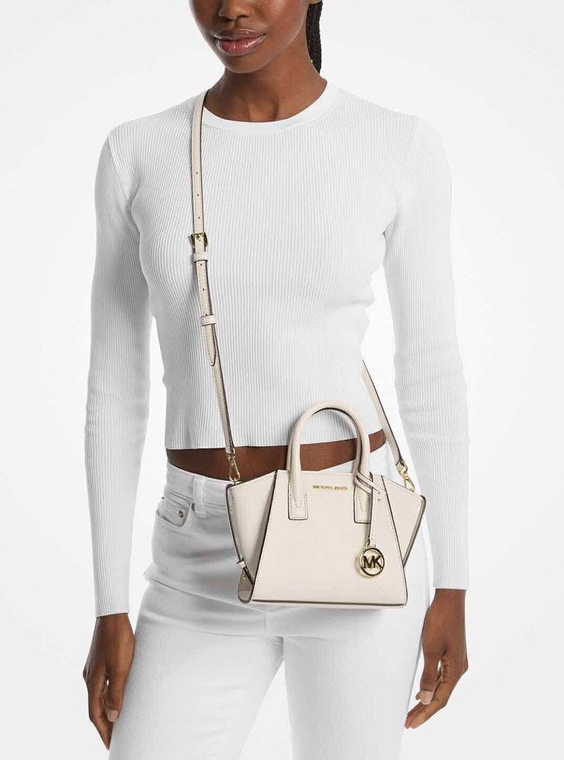 Michael Kors Avril Mini Bag (Category: Luxury Bags & Wallets) located in Santiago. Submitted by melanyas.fab.finds (Listing ID 1428062998, Image 1). Description: - Michael Kors Avril Mini Bag - Shoulder bag style - Mini size, perfect for essentials - Classic Michael Kors design - Versatile color.