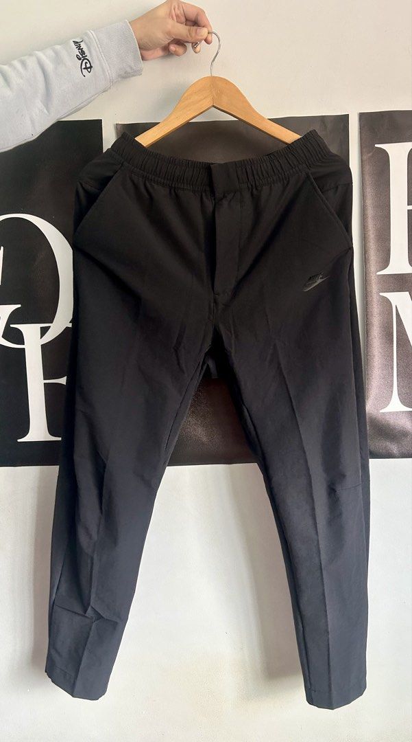 Nike Men's Woven Commuter Pants (Category: Jeans) located in Pasig City. Submitted by trina1027 (Listing ID 1427995637, Image 2). Description: FOR SALE! Brand new | On hand | Original Nike Men's Woven Commuter Pants 💯 Size: Medium & Large Selling Price: 1,850 SRP: 3,295 MOP: Gcash/BDO bank transfer Shipping thru: LBC/Lalamove 📍Pasig Location Like & Follow: FB Page: Trina's Sportswear IG: trinas_sportswear.