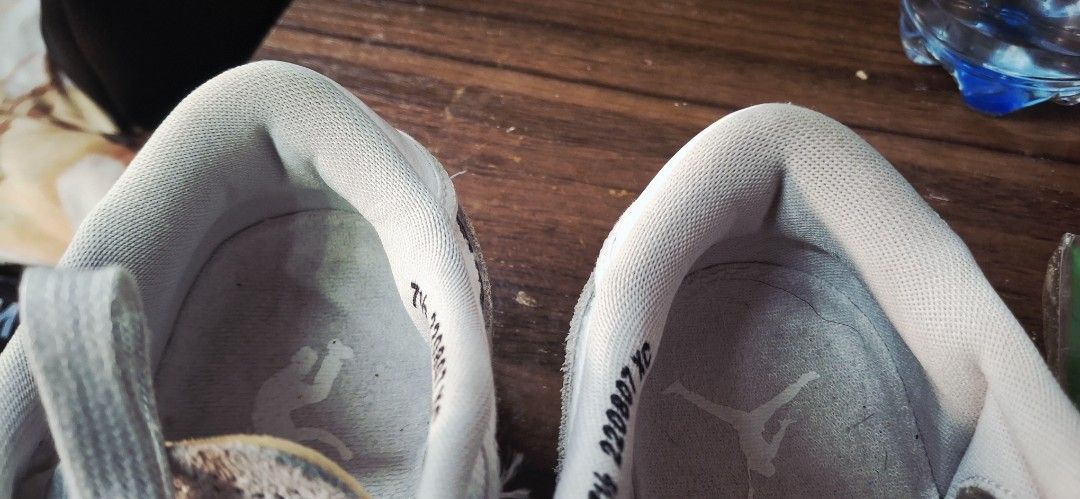Nike x UN/LA Jordan 1 Low (Category: Sneakers) located in Manila. Submitted by bee.geema (Listing ID 1428003145, Image 2). Description: These Nike x UN/LA Jordan 1 Low sneakers feature a light blue and grey colorway. The shoes have the Nike swoosh logo and the UN/LA tag. The size is 7.5. The soles show some wear. The shoes have white laces and a white sole..