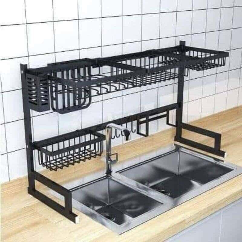 Over-the-Sink Dish Drying Rack (Category: Other Kitchenware & Tableware) located in Manila. Submitted by haideee (Listing ID 1428036212, Image 2). Description: Over-the-sink dish drying rack is designed to maximize kitchen space. It features multiple compartments for plates, bowls, utensils, and other kitchen items. The rack has a black finish and is designed to fit over a double sink. Dimensions are 65cm/85cm (length), 52cm (height), and 32cm (w