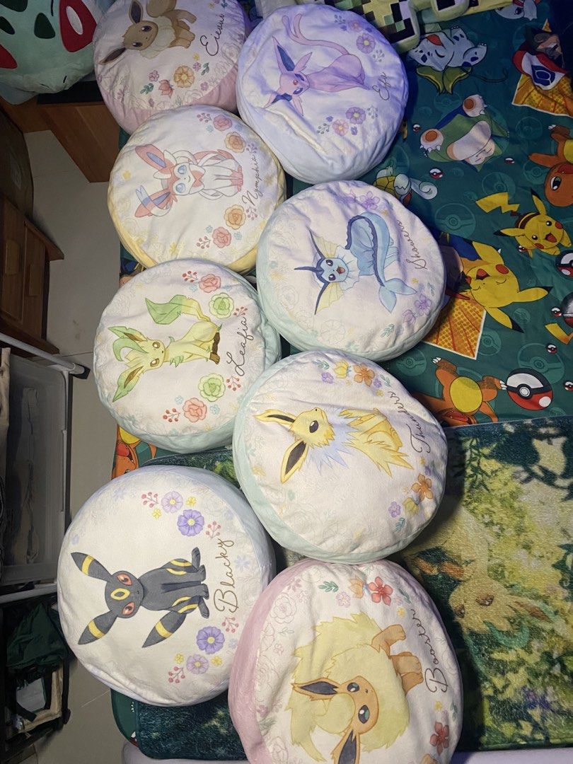 Pokemon Eevee Evolution Round Pillows (Category: Plushies & Soft Toys) located in Manila. Submitted by jongamba0773283 (Listing ID 1428094902, Image 1). Description: Selling Eeveelution Pillows set of 8 with free eevee pillow 3000.