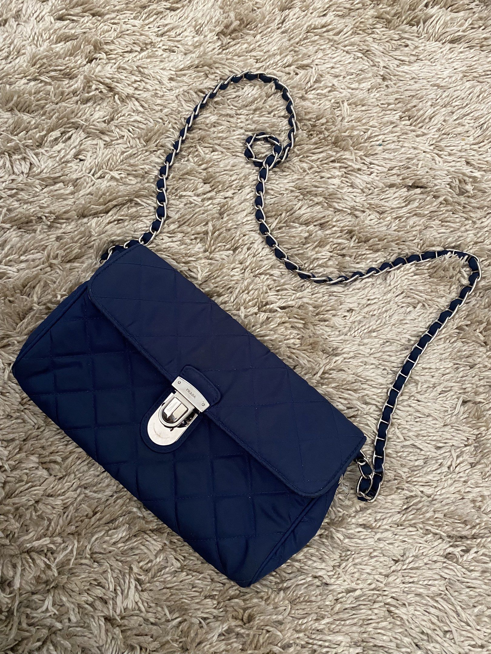 SALE! Prada Blue Quilted Nylon Crossbody Bag (Category: Luxury Bags & Wallets) located in Santa Rosa. Submitted by happydays__ (Listing ID 1428058440, Image 3). Description: Rare find! Prada Silver Chain Quilted Nylon Crossbody Guaranteed Authentic Got this from Madrid Really nice! Message me for more details Loc: Nuvali area Thanks .