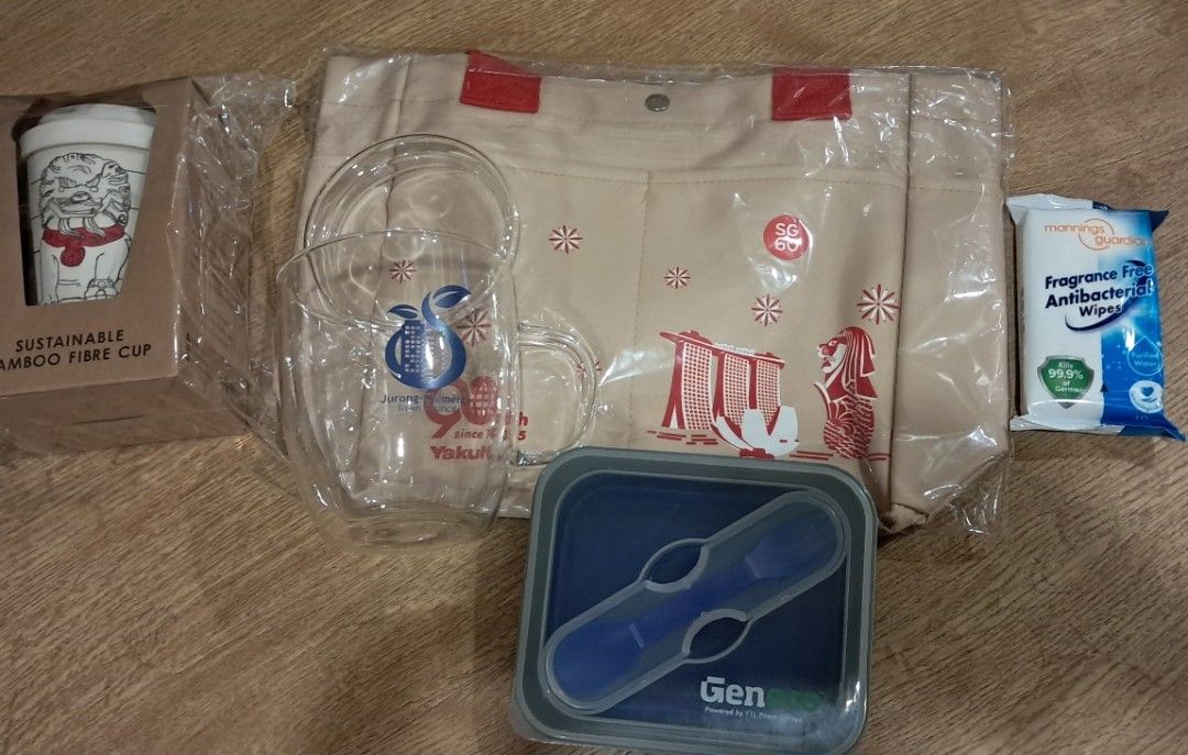 Random stuff (Category: Everything Else) located in Singapore. Submitted by kudafari (Listing ID 1428054774, Image 1). Description: Bundle includes a SG60 Yakult tote bag, a glass cup, a sustainable bamboo fibre cup from The Art Faculty, a Geneco lunchbox (wipes is for size reference only). All items are new and unused but not for fussy. Collection from block only. (Update: Tote bag taken).