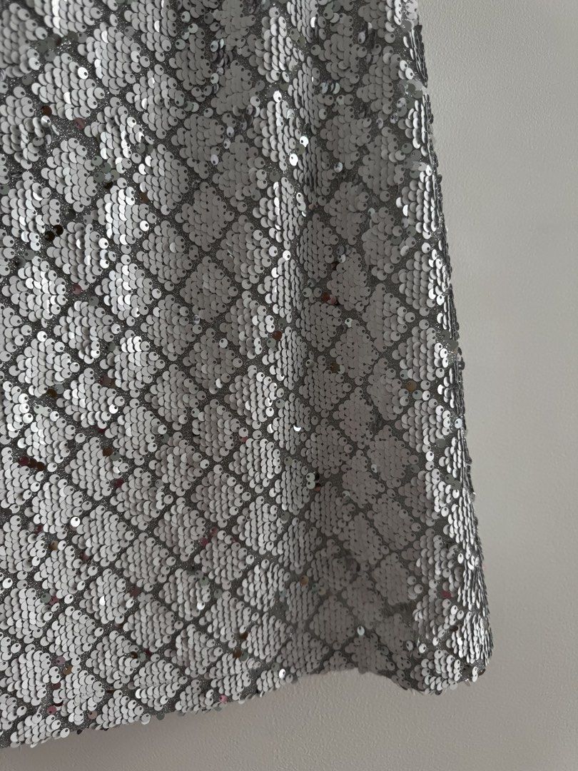 Sequin Silver & White Dress with Pearl Straps (Category: Dresses) located in Manila. Submitted by eunsaema (Listing ID 1427973259, Image 3). Description: L on tag but suitable for M girls 🤍 - worn once - perfect for parties and events - Original price is 3k +.