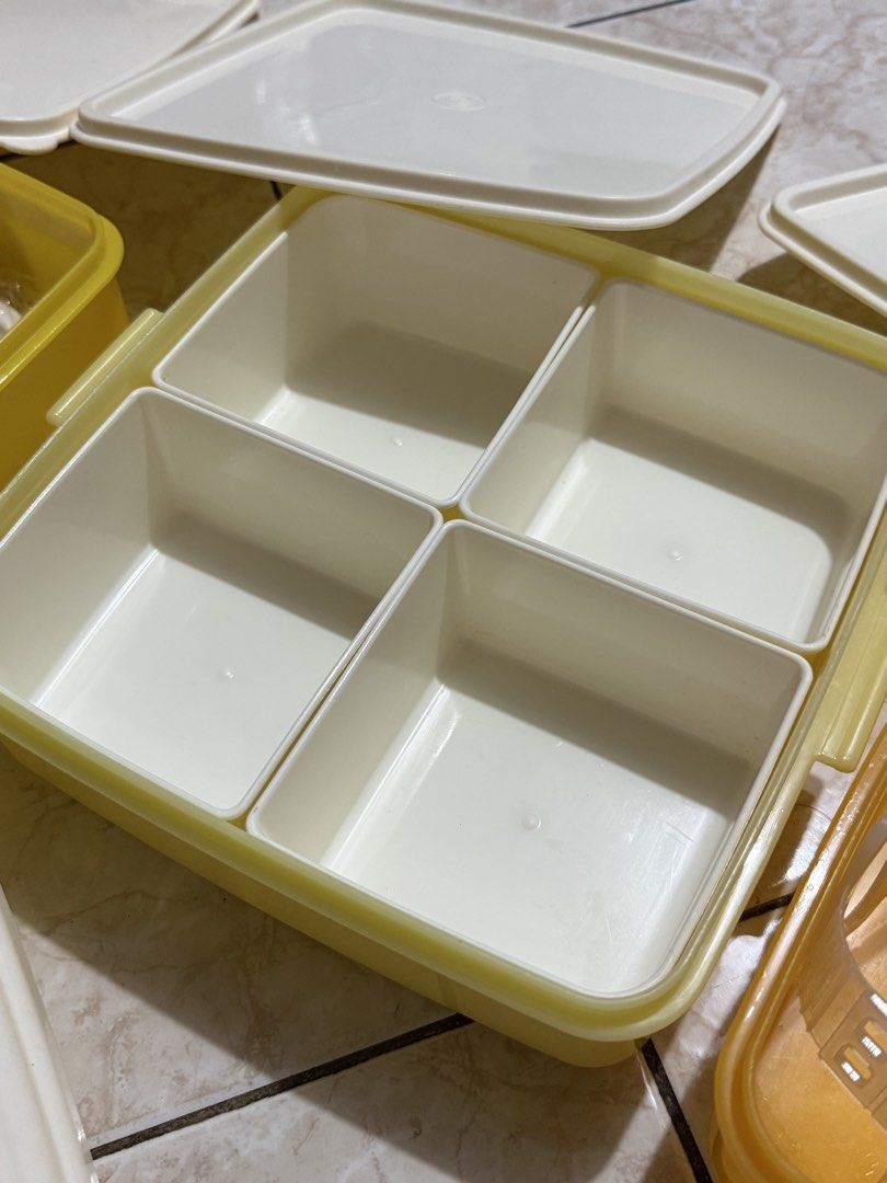Classic / Retro Snoopy and Friends Lunch Box Set Tupperware (Category: Food Organization & Storage) located in Valenzuela. Submitted by missp22 (Listing ID 1428078556, Image 3). Description: Snoopy lunch box set includes three stackable containers, each with a lid. The top container features a Snoopy and Friends design. The set also comes with a compartmented container, plates, and cutlery. Perfect for packing lunches or storing snacks. The conta