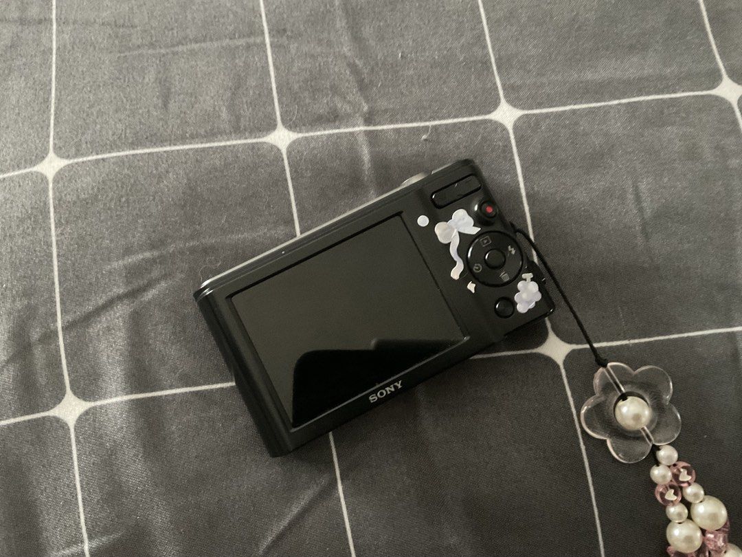 Sony Digital Camera with 6x Optical Zoom (Category: Cameras) located in Pasig City. Submitted by m_decluttering (Listing ID 1427954421, Image 2). Description: SONY CYBERSHOT DSC W810 black - 20.1mp - 6x optical zoom - lens is clean - flash and all buttons are working - body cosmetics 8/10 - CRISP OUTPUT - READY TO USE - crowd’s fave! - first owner!!! - has beauty effects +you can adjust it! - NO FUNCTIONAL ISSUES inclusions - unit, original sony 