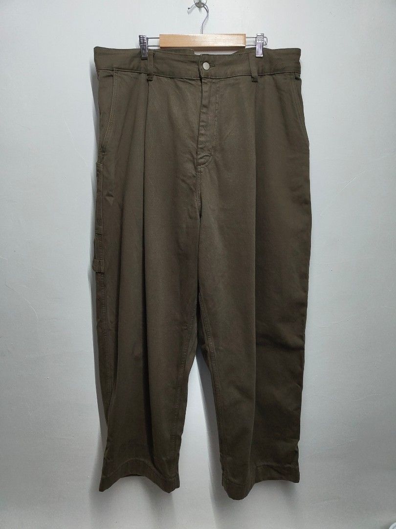 Studio Nicholson Bridges Denim Pant - Fossil (Category: Chinos) located in Antipolo. Submitted by amdri (Listing ID 1428039129, Image 2). Description: The Studio Nicholson Bridges Denim Pant in the colour Fossil have the perfect neutral tone. with the brand's signature pleating and oversized fit. 100% Cotton Details - 100% Cotton - Buckle back detail - Hammer hook - Full, oversized fit - 13oz recycled garment dyed denim fabrication *Model is 6'2"