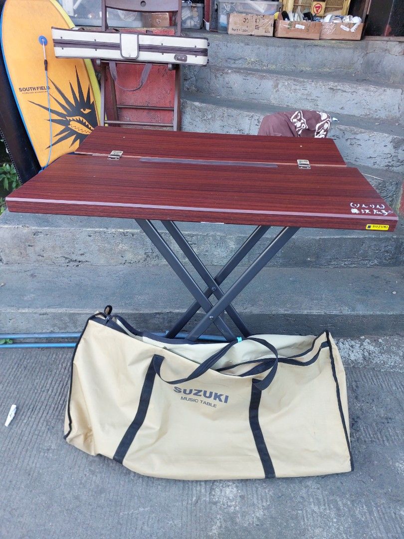 Suzuki Folding Table with Carry Bag (Category: Musical Instruments) located in Quezon City. Submitted by jpnvintageonline (Listing ID 1427950328, Image 1). Description: SUZUKI musical table Multi purpose keyboard stand etc... In Good condition Heavy duty Japan 1450php .