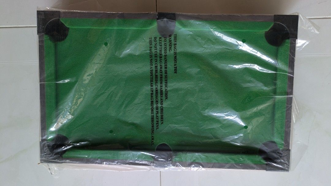 Tabletop pool table (Category: Board Games & Puzzles) located in Singapore. Submitted by songgg (Listing ID 1427966652, Image 2). Description: Mini pool table (full set) Only used once or twice Item is like new, the box has some dents/scuffs.