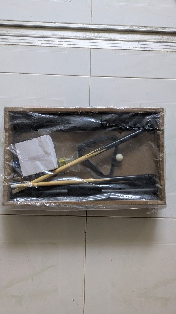 Tabletop pool table (Category: Board Games & Puzzles) located in Singapore. Submitted by songgg (Listing ID 1427966652, Image 3). Description: Mini pool table (full set) Only used once or twice Item is like new, the box has some dents/scuffs.