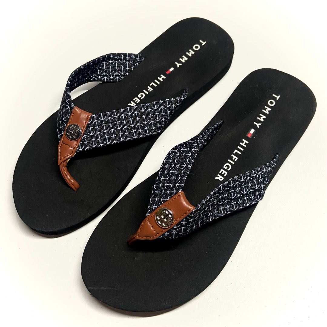 Tommy Hilfiger Flipflop Slippers (Category: Slippers and slides) located in Las Pinas. Submitted by rewearstudios (Listing ID 1428086754, Image 2). Description: Great brand! The sandals features thong straps with Anchor print and a signature Tommy Hilfiger logo, open toe, slip-on style, branded footbed and flat rubber sole. Very comfortable and perfect for any outfit! Pm me for more pics and details!.