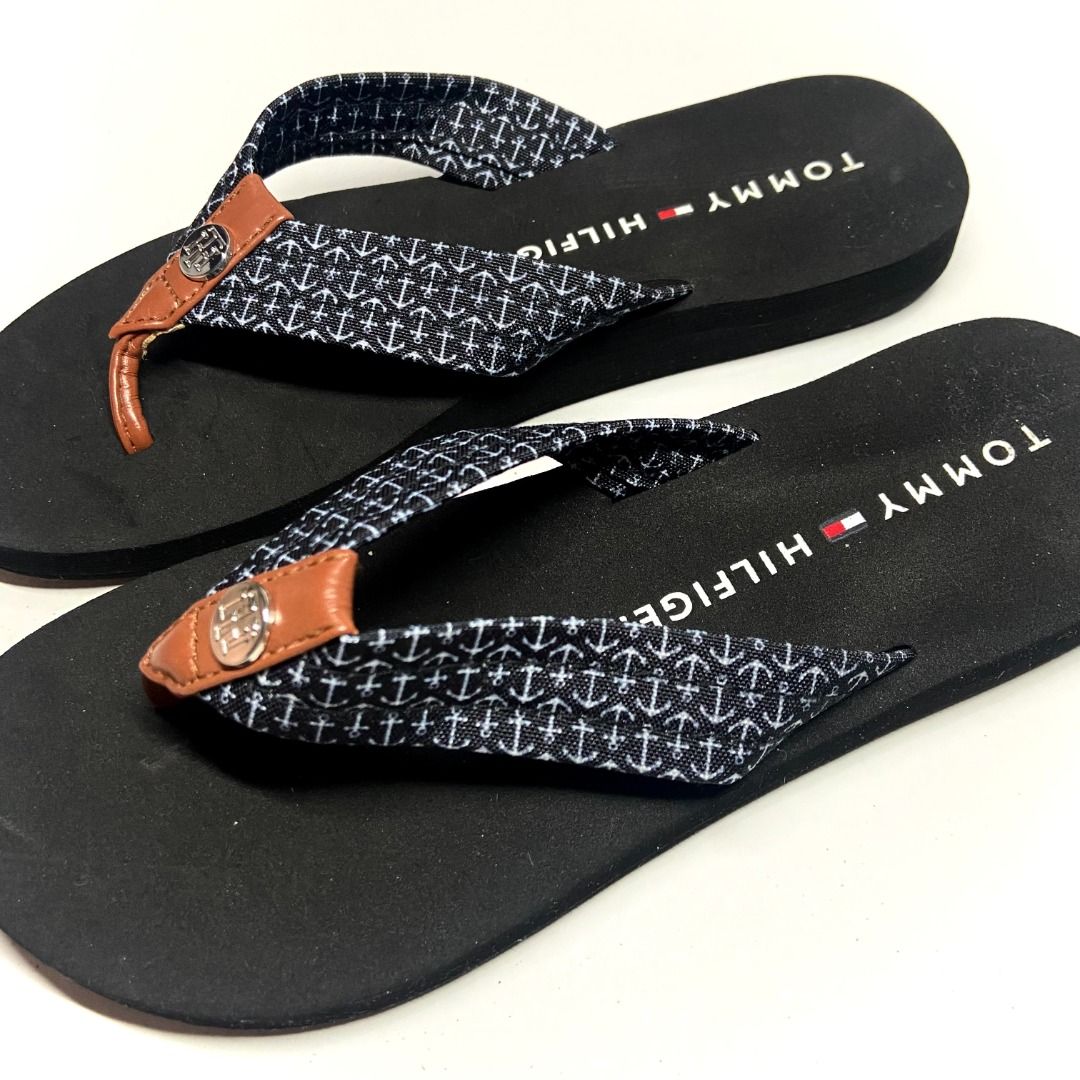 Tommy Hilfiger Flipflop Slippers (Category: Slippers and slides) located in Las Pinas. Submitted by rewearstudios (Listing ID 1428086754, Image 3). Description: Great brand! The sandals features thong straps with Anchor print and a signature Tommy Hilfiger logo, open toe, slip-on style, branded footbed and flat rubber sole. Very comfortable and perfect for any outfit! Pm me for more pics and details!.