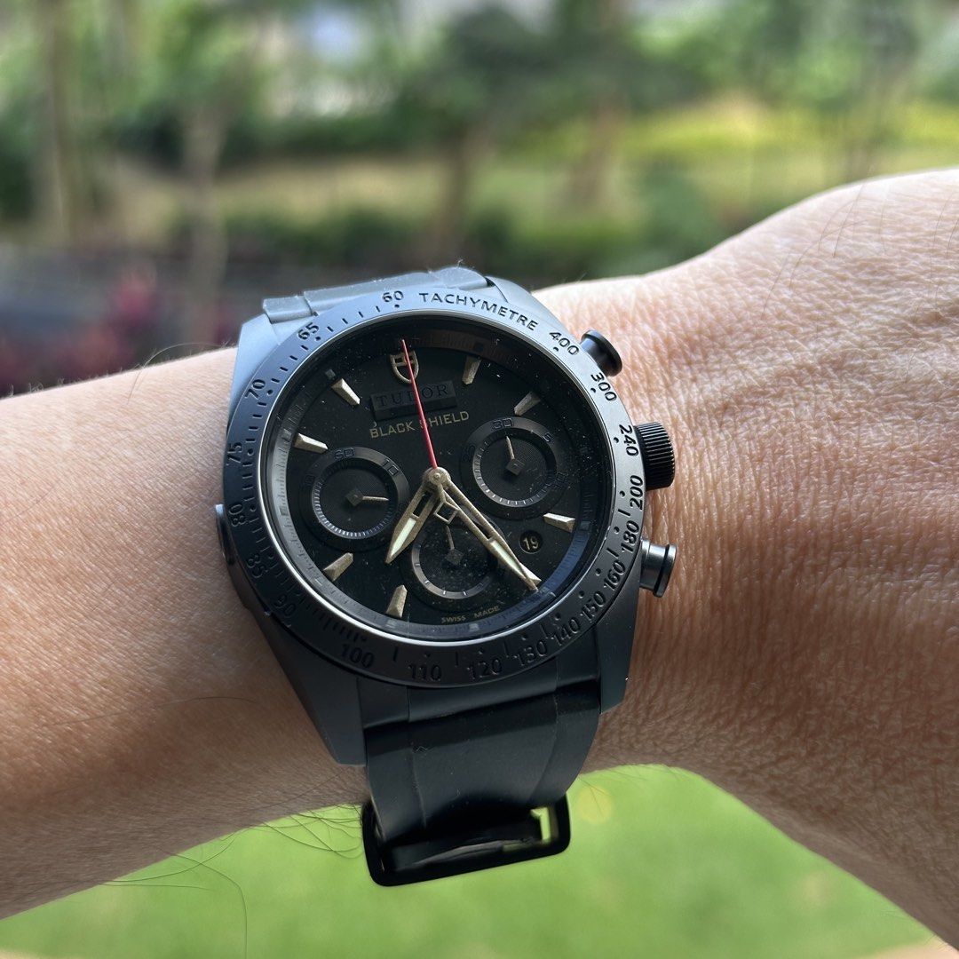 Tudor Fastrider Black Shield Chronograph Watch (Category: Watches) located in Singapore. Submitted by king_eric (Listing ID 1427976675, Image 1). Description: Tudor Fastrider Black Shield Chronograph Watch Model : 42000CN Calibre : Tudor 7753 (27 jewels, 28,800 beat/hour, power reserve ~46 hours) Matte black ceramic bezel (fixed) with engraved tachymetric scale 42mm black ceramic case with black PVD deployment clasp on black rubber strap Full box