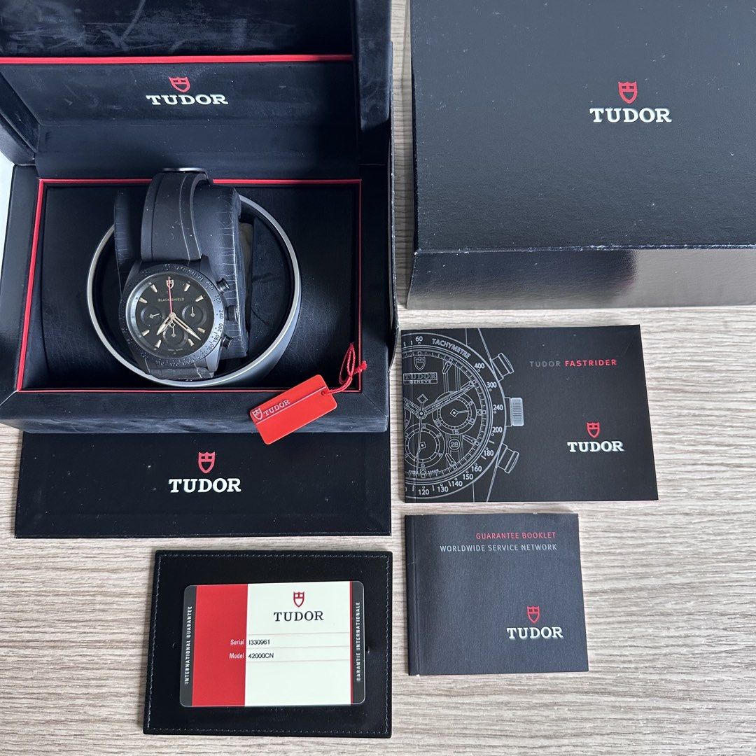 Tudor Fastrider Black Shield Chronograph Watch (Category: Watches) located in Singapore. Submitted by king_eric (Listing ID 1427976675, Image 2). Description: Tudor Fastrider Black Shield Chronograph Watch Model : 42000CN Calibre : Tudor 7753 (27 jewels, 28,800 beat/hour, power reserve ~46 hours) Matte black ceramic bezel (fixed) with engraved tachymetric scale 42mm black ceramic case with black PVD deployment clasp on black rubber strap Full box