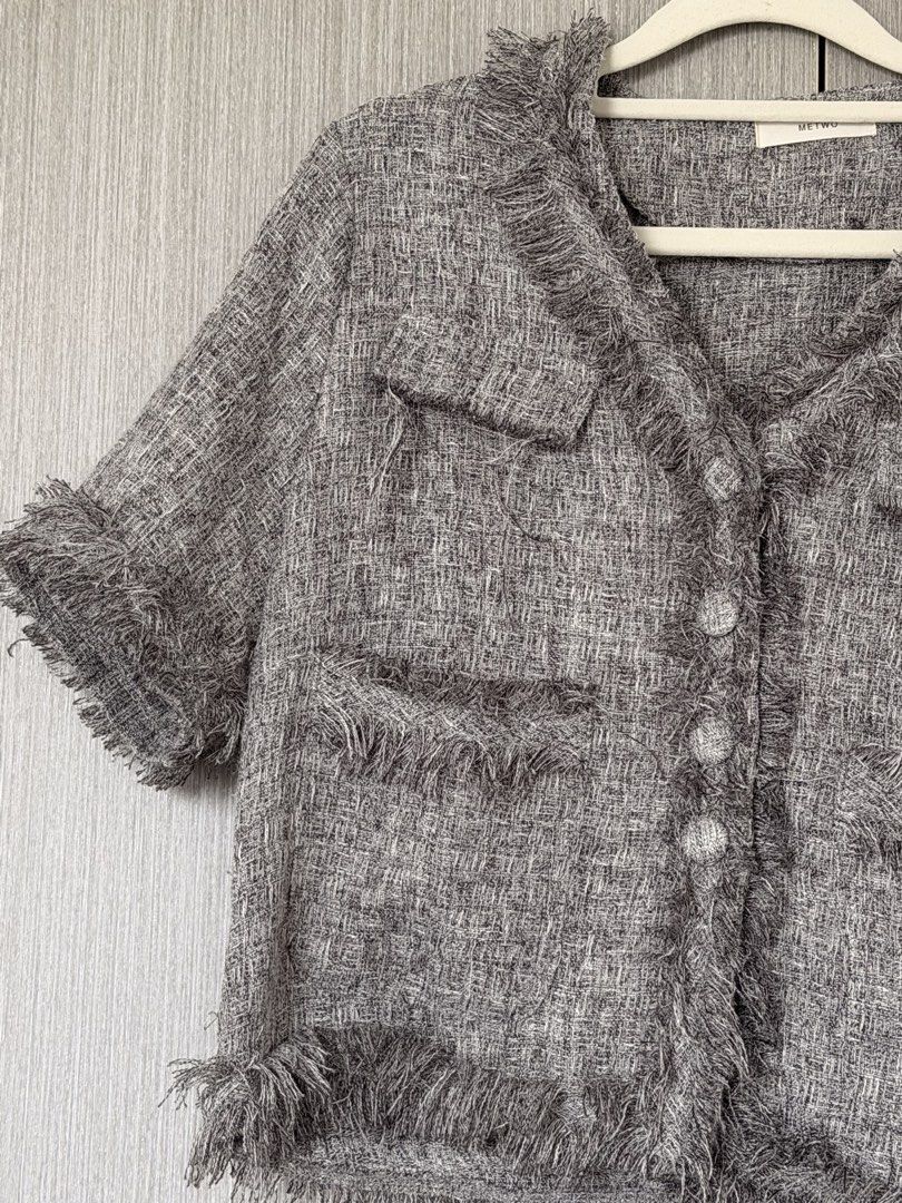 Tweed Jacket with Fringe Detail (Category: Coats, Jackets and Outerwear) located in Pasay City. Submitted by wuangel_ (Listing ID 1427963351, Image 3). Description: Tweed jacket features a classic design with a V-neck and short sleeves. It has a button-down closure and two front pockets. The jacket is accented with fringe detailing along the collar, pockets, and hem. It's a stylish piece that can elevate any outfit..
