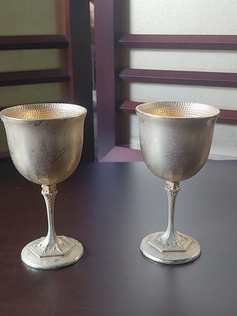Vintage Japanese Sake Cups (Category: Coffee & Tea Tableware) located in Bulacan. Submitted by hnbfinds (Listing ID 1427947203, Image 3). Description: Vintage Japanese 24K gold-plated (24KGP) sake cups or goblets. Key Identification Features Material: They are typically gold-plated over a base metal, often indicated by a "24KGP" hallmark on the bottom of the base. Design: These goblets feature a distinctive hammered texture on the interior of the