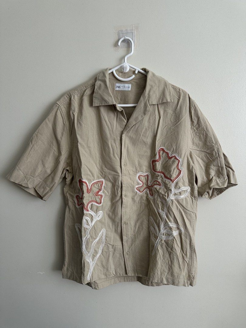 Zara Floral Embroidered Shirt (Category: Shirts) located in Manila. Submitted by peebss18 (Listing ID 1428067261, Image 2). Description: Zara Floral Embroidered Shirt (Men M) Condition: Good / lightly used Size: Medium (fits M comfortably) Dimensions: L – 28” / W – 22.5” Details: • Premium Zara shirt with intricate floral embroidery • Lightweight and breathable cotton / cotton-blend material • Stylish for casual, semi-casual, or smart-casual outf