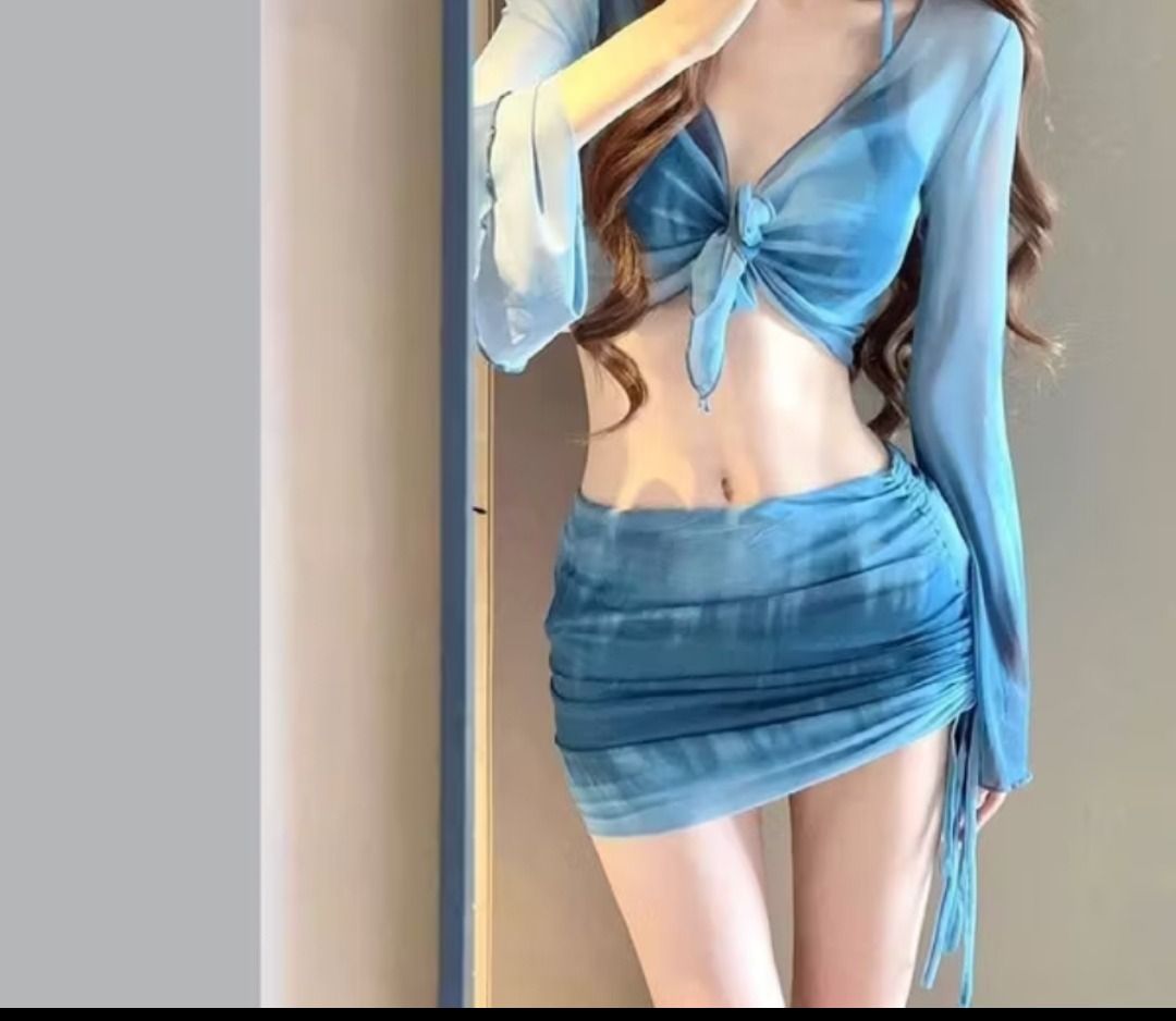 4 in 1 Swimsuit Set (Category: Bikinis & Swimsuits) located in Pasig City. Submitted by ta.ccc (Listing ID 1428205216, Image 2). Description: Swimsuit set features a blue tie-front top with long sleeves and a matching ruched mini skirt. The fabric has a subtle tie-dye effect. The top has a halter neck design. The skirt has adjustable drawstring details on the side. Perfect for beach days or pool parties. orig price is ₱293 but selling it for ₱220