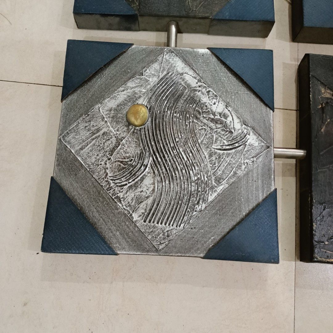 Abstract Square Wall Art (Category: Wall Decor) located in Makati City. Submitted by crstnemrise (Listing ID 1428119406, Image 3). Description: Unique abstract wall art featuring nine square panels. Each panel has a different design with a mix of colors, textures, and metallic accents. The panels are connected by metal rods, creating a cohesive and modern look. Perfect for adding a touch of artistic flair to any room. •Collapsible Painting •Orig.