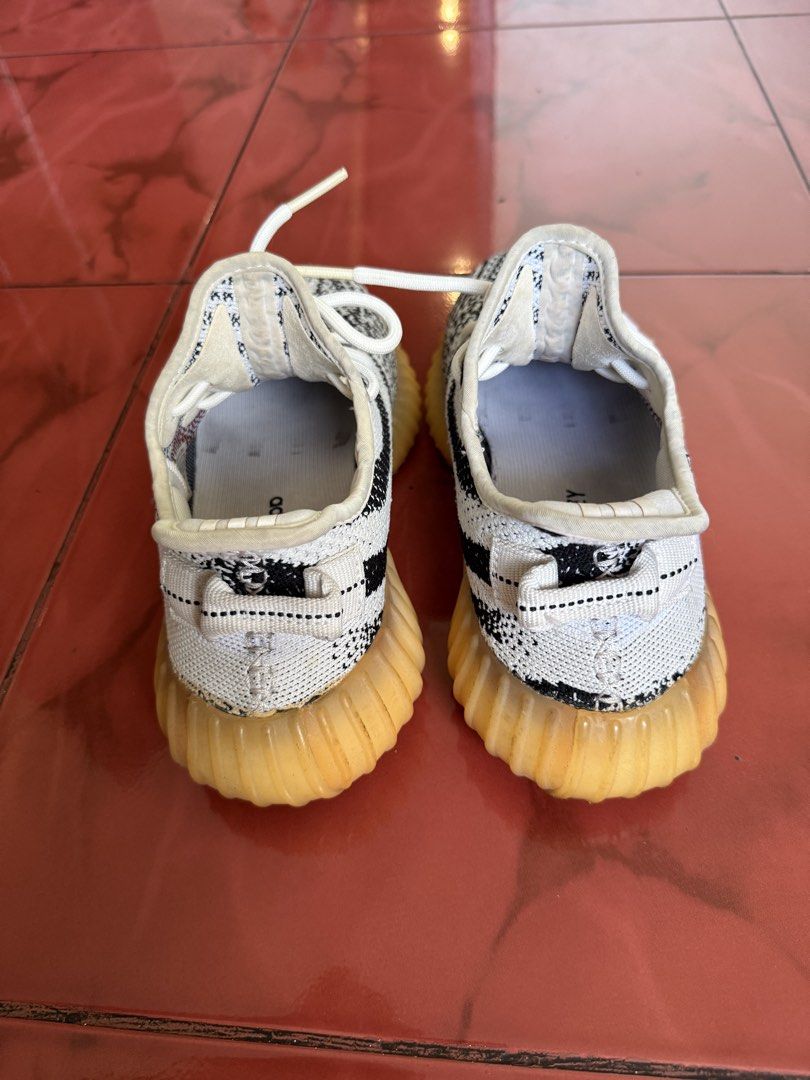 Adidas Yeezy Boost 350 V2 Zebra (Category: Sneakers) located in Quezon City. Submitted by sulitselections (Listing ID 1428174182, Image 3). Description: Pre-Loved, managed expectations. ORIGINAL AUTHENTIC GENUINE Fixed Price Location: Project 8 QC Near Mindanao Ave cor Road 20 Pick up via Lalamove. Buyer to book and shoulder shipping fee. RFS: Decluttering .