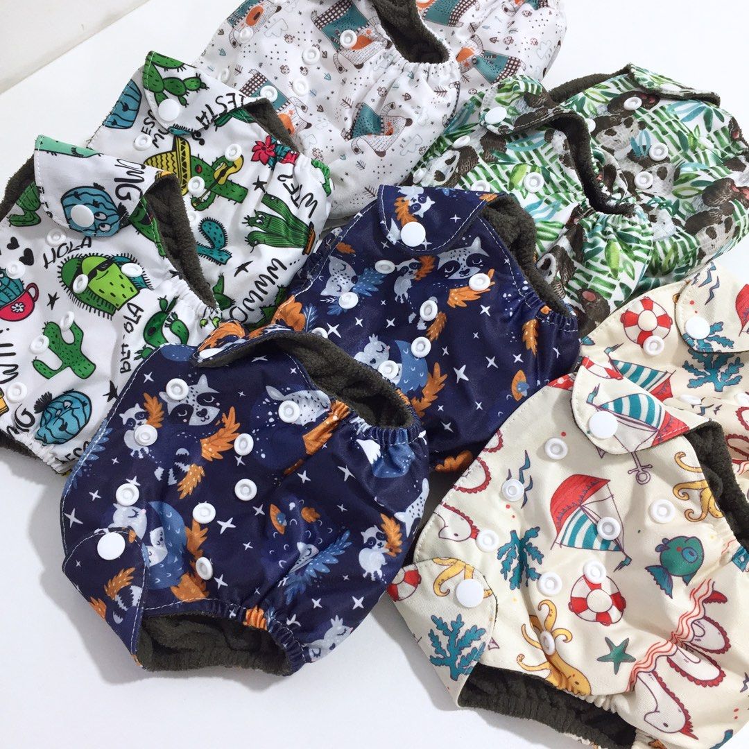 Adjustable Reusable Cloth Diapers for Boys 0-3 months (Category: Diapers & Baby Wipes) located in Batangas. Submitted by shylalorraine (Listing ID 1428104658, Image 1). Description: The adjustable cloth diapers are used 4x only and we switch disposable diaper right after. Selling this as a whole set only total of 10 pcs. The cloth diapers is good for 0-3 months old..