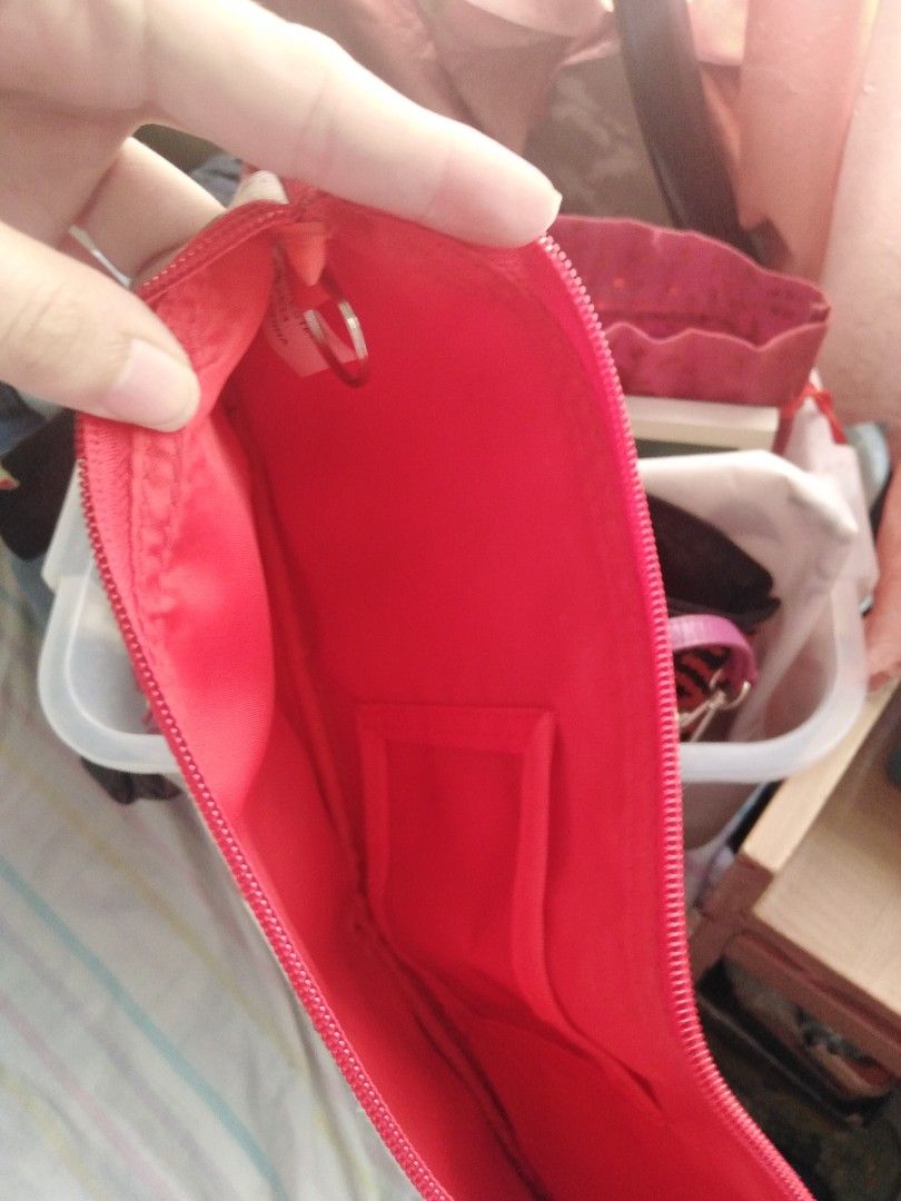 Billabong Strawberry Pencil long case (Category: Cases & Sleeves) located in Manila. Submitted by issabakikay (Listing ID 1428100094, Image 2). Description: Billabong pencil case features a vibrant strawberry print on a white background. It has a red zipper and a red interior. Inside, there is a small pocket for organizing smaller items..
