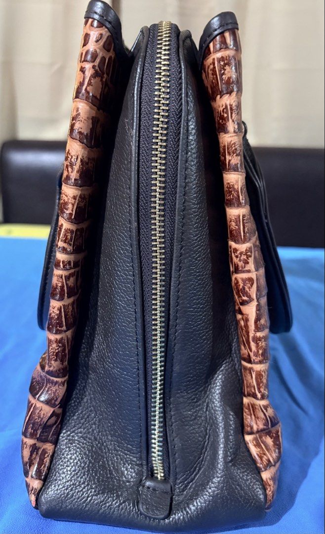 SALE Brown Crocodile-Embossed Handbag (Category: Tote Bags) located in Manila. Submitted by truedeclutter (Listing ID 1428128726, Image 2). Description: Dimensions L 31 cm W 12 cm H 25 cm Genuine leather, crocodile embossed No major visible flaws.