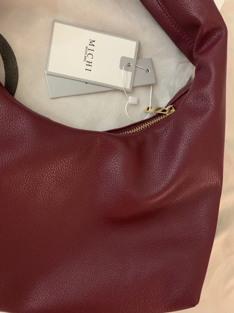 Burgundy soft leather hobo bag spacious (Category: Shoulder Bags) located in Cavite. Submitted by mommyb3 (Listing ID 1428205479, Image 2). Description: - Burgundy soft leather hobo bag - Spacious in - Stylish design - Perfect for everyday use.