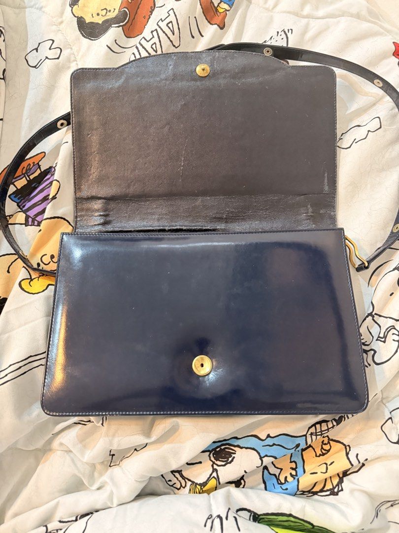 Celine Navy Messenger Bag (Category: Luxury Bags & Wallets) located in Cainta. Submitted by kitskit (Listing ID 1428176556, Image 2). Description: - Suede in great condition - 2 pockets - adjustable straps - Flaws, interior leather cracks .