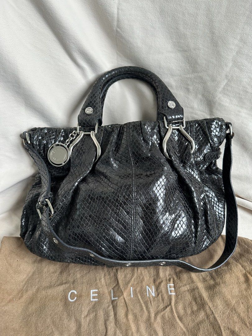 Celine Python Leather Handbag (Category: Bags & Wallets) located in Singapore. Submitted by jlux_sg (Listing ID 1428162362, Image 1). Description: Excellent condition overall • Phoebe Philo era craftsmanship • Exotic Céline RRP SGD 6k+ • With item, strap, dust bag [1848-B554] — JLUX Terms All items are [PRE-OWNED] and may show light wear or age marks not captured in photos. All sales are [FINAL]. No refunds, returns, or exchanges under any circum