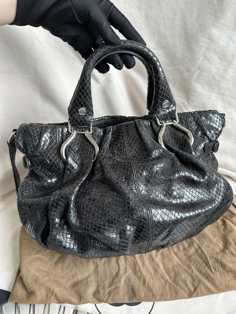 Celine Python Leather Handbag (Category: Bags & Wallets) located in Singapore. Submitted by jlux_sg (Listing ID 1428162362, Image 2). Description: Excellent condition overall • Phoebe Philo era craftsmanship • Exotic Céline RRP SGD 6k+ • With item, strap, dust bag [1848-B554] — JLUX Terms All items are [PRE-OWNED] and may show light wear or age marks not captured in photos. All sales are [FINAL]. No refunds, returns, or exchanges under any circum