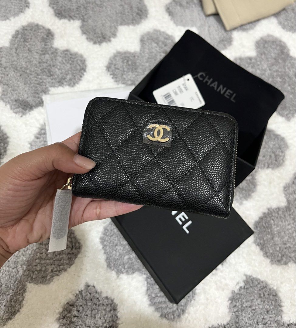 Chanel Quilted Zip Wallet (Category: Luxury Bags & Wallets) located in Mandaluyong City. Submitted by heyjazzzie (Listing ID 1428214988, Image 3). Description: CHANEL QUILTED ZIPPED CARDPURSE/SMALL WALLET in Classic Colorway Black Caviar Leather GHW (PREMIUM) Unused & In excellent condition. Rank 10 Comes with complete inclusions ~ box, dustbag, tags, booklet PRICE: 2,899 Japan sourced WITH CODE RFS: will buy a diff style kasi hindi kasya yung ca