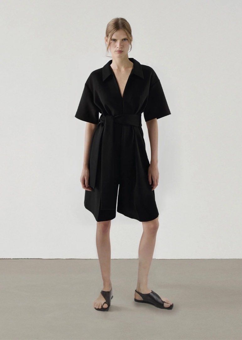 COS Black Jumpsuit with Belt (Category: Jumpsuits) located in Tanza. Submitted by deeclutterer (Listing ID 1428200063, Image 1). Description: COS Open collar jumpsuit (Missing wide black belt) Belt in the photo not included (You may use any wide belt) Sleek, elegant look My fave! Small on tag fits to Medium Good as new! ₱1,200.