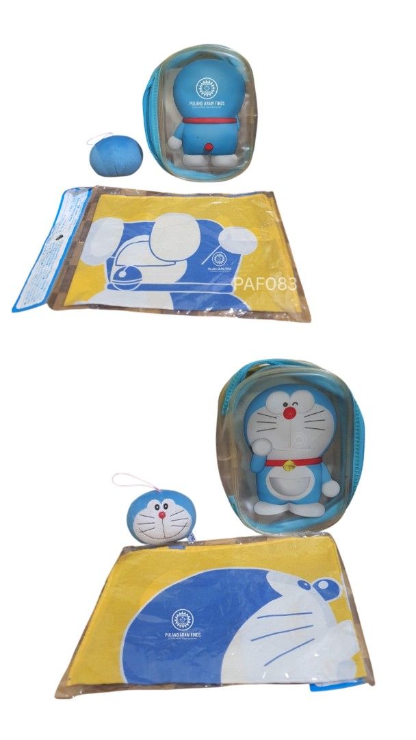 Doraemon Bundle (Category: Character Goods) located in Cebu City. Submitted by pulangarawfinds (Listing ID 1428253259, Image 2). Description: - Doraemon Bundle - Includes: case, keychain plush, and towel - Features Doraemon design - Perfect for collectors or gifts.