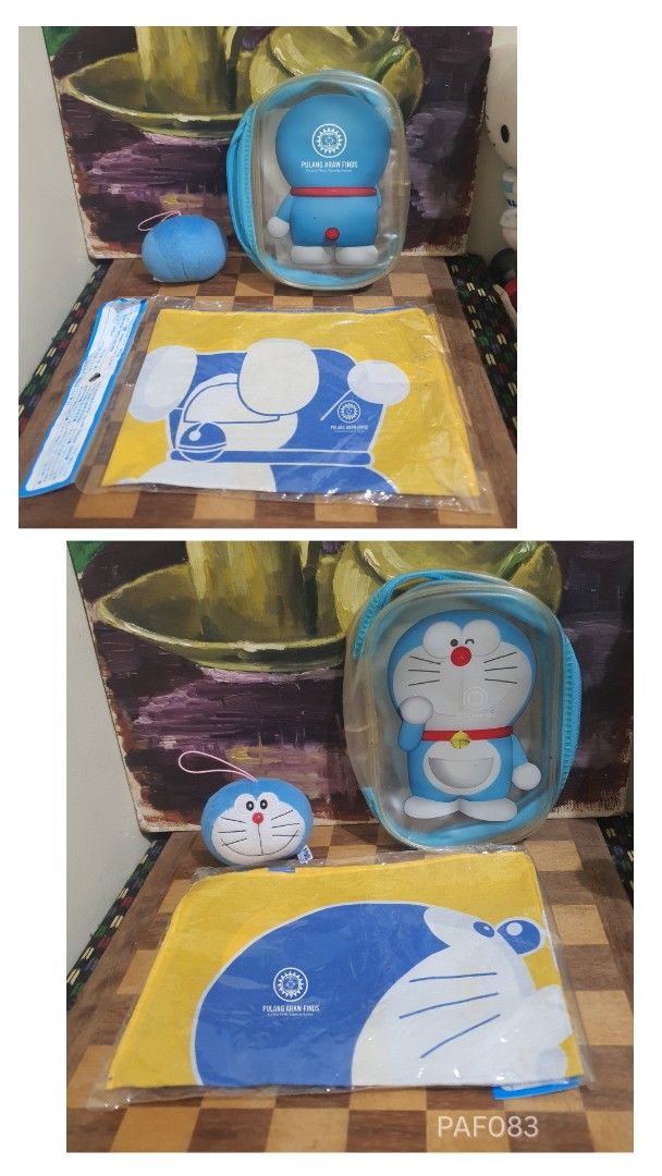 Doraemon Bundle (Category: Character Goods) located in Cebu City. Submitted by pulangarawfinds (Listing ID 1428253259, Image 3). Description: - Doraemon Bundle - Includes: case, keychain plush, and towel - Features Doraemon design - Perfect for collectors or gifts.