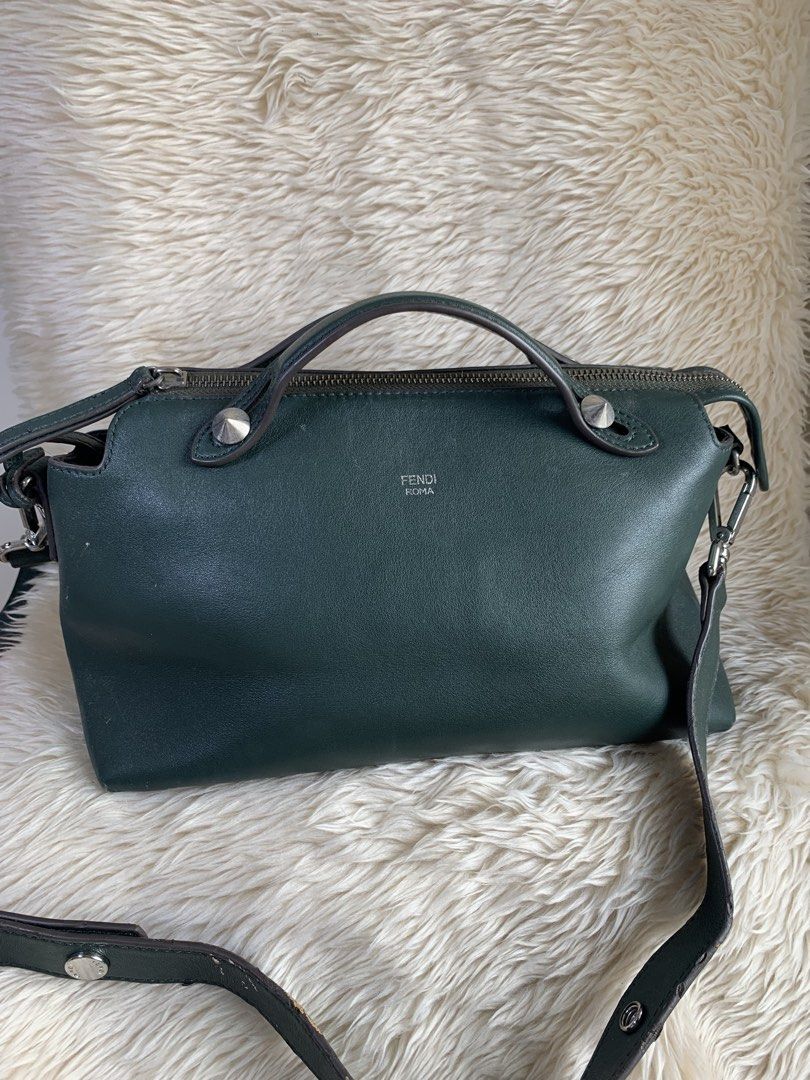 Fendi By The Way (Category: Luxury Bags & Wallets) located in Quezon City. Submitted by she-ann (Listing ID 1428234408, Image 1). Description: Authentic Green leather handbag from Fendi Roma. Features a top handle and a detachable shoulder strap. The bag has a silver zipper and studs. The Fendi Roma logo is visible on the front. No wholes sa corners. Normal signs of usage lang yung corners which can be recolored if you want Flaws: just the edge o