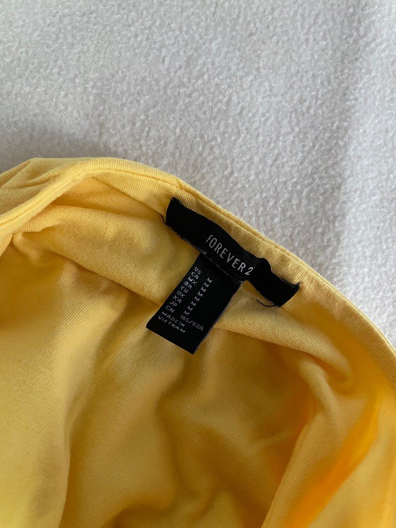 Forever 21 Yellow Tube Top (Category: Others Tops) located in Baguio. Submitted by msnicolette (Listing ID 1428176166, Image 2). Description: •M on tag but best fit is small •No when worn photos •Gcash payment only Sf shouldered by the buyer via J&T shipping .