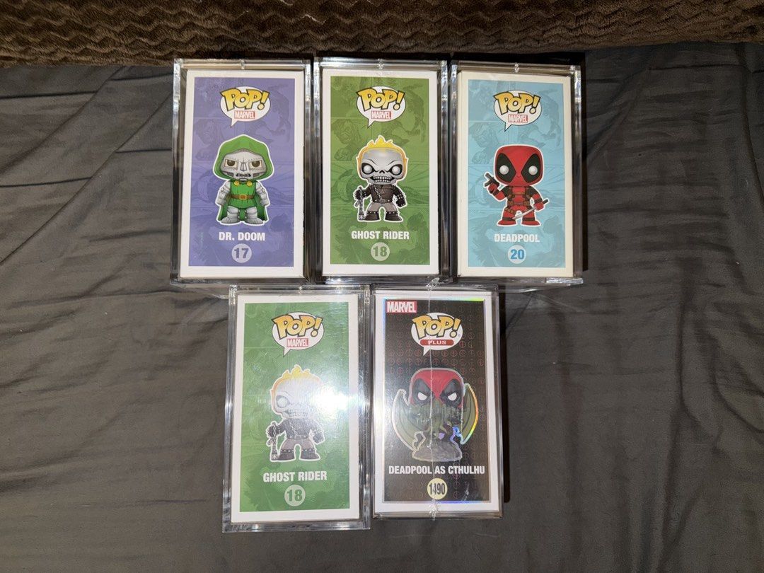 Funko Pop! Marvel Grails (Category: Designer & Blind Box Toys) located in Quezon City. Submitted by exceeph (Listing ID 1428186542, Image 2). Description: Price is negotiable if all items are taken Marvel Deadpool as Cthulhu Glow #1490 - 15,000 Marvel Deadpool Metallic SDCC 2013 #20 - 30,000 Marvel Ghost Rider Metallic SDCC 2013 #18 - 36,000 Marvel Ghost Rider Metallic SDCC 2013 #18 (No Sticker) - 20,000 Marvel Dr Doom Metallic Con Exclusive 2014