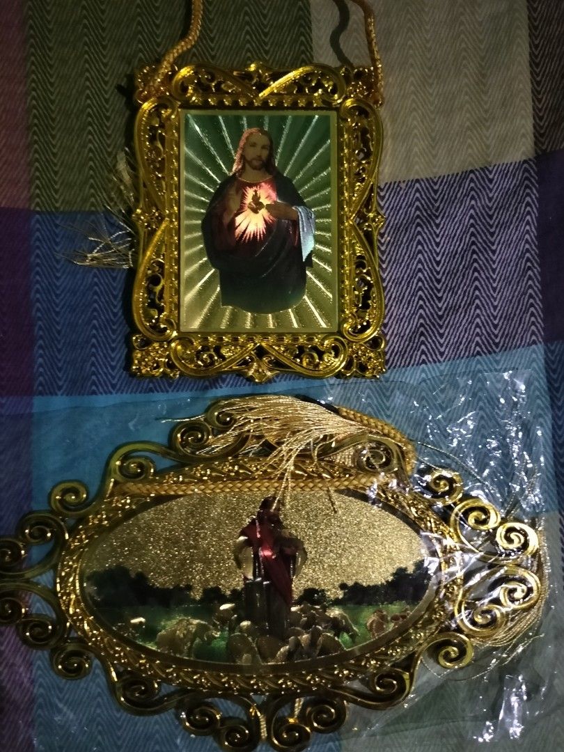 Gold Framed Religious Items Set (Category: Religious Items) located in Cavite. Submitted by taro_sakamoto_23 (Listing ID 1428188490, Image 3). Description: Set includes a gold-framed picture of Jesus, a gold-colored crucifix, and a clear glass block with an inscription. The framed pictures have intricate gold detailing. The crucifix features a figure of Jesus. The glass block has an inscription on it. All items appear to be decorative and suitabl