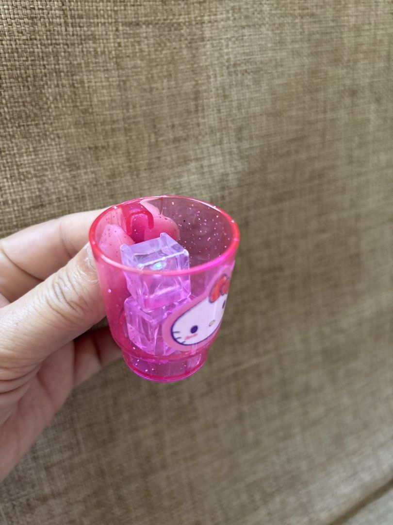 Bundle: Hello Kitty Strawberry Cup Set (Category: Coffee & Tea Tableware) located in Calamba. Submitted by cur8d (Listing ID 1428139366, Image 3). Description: ice cream, cup, 2 ice cubes .