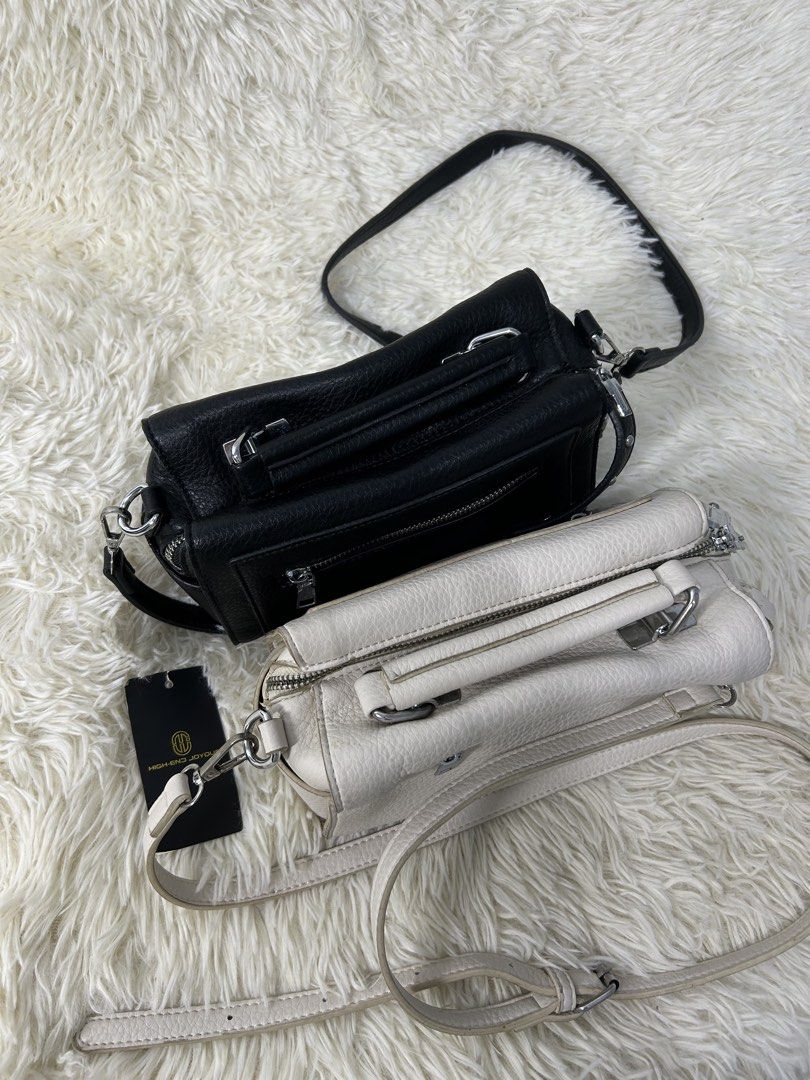 High End Joyous Crossbody Bag (Category: Cross-body Bags) located in Manila. Submitted by riided (Listing ID 1428217676, Image 2). Description: BOTH black unused white slightly used.