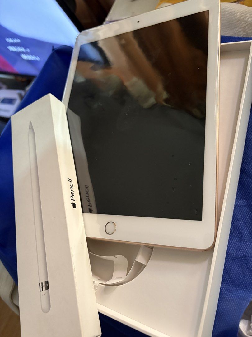 iPad 6th gen 128GB wifi (Category: iPad) located in Quezon City. Submitted by a.roa (Listing ID 1428154534, Image 2). Description: Comes with an authentic 1st Generation Apple Pencil and charger with cable. Has signs of use. Bought at Power Mac Both use Lightning Cable Lost the cap of the Apple Pencil No history of repair .