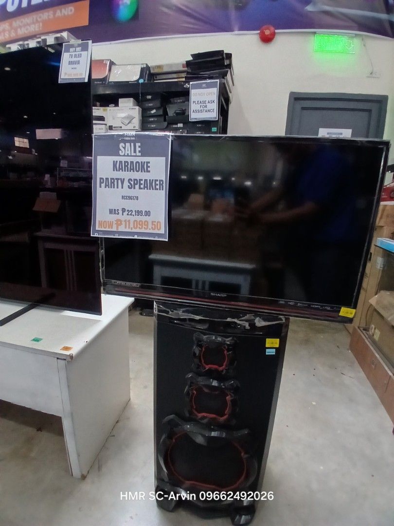 Karaoke Party Speaker - Sale (Category: Soundbars, Speakers & Amplifiers) located in Manila. Submitted by sc_arvin (Listing ID 1428130858, Image 1). Description: Karaoke party speaker on sale. The original price was ₱22,188.50, now selling for ₱11,089.50. The speaker is black with red accents. Contact HMR SC-Arvin at 09662492026 for inquiries..