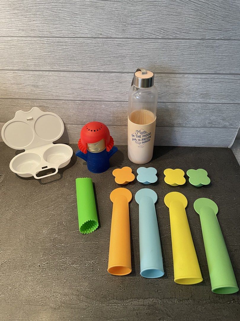 Kitchen bundle (Category: Cookware & Accessories) located in Singapore. Submitted by lj1973 (Listing ID 1428173181, Image 1). Description: Set includes a microwave egg cooker, a glass water bottle, and various kitchen accessories. The egg cooker is designed for easy egg preparation. The bottle is perfect for staying hydrated. Other accessories include silicone ice cream/jelly molds, garlic peeler and angry mama microwave cleaner. Collect from Bed