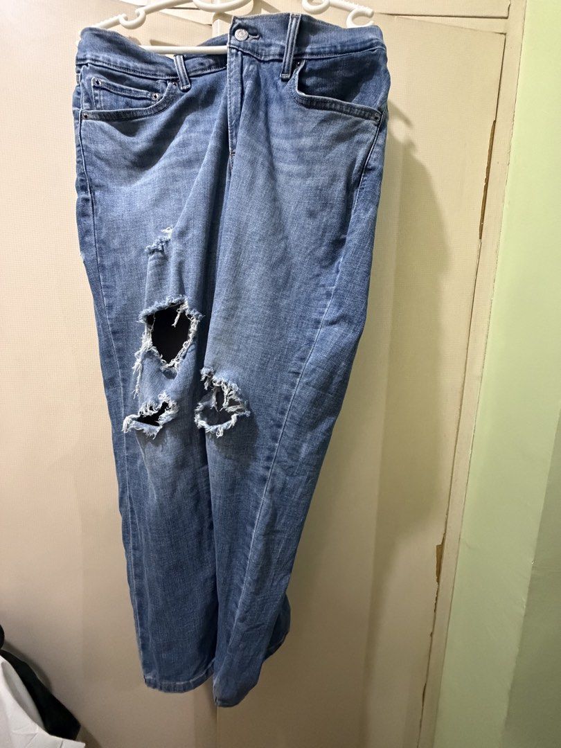 Levi's Boyfriend Jeans - Size 32 (Category: Jeans) located in San Juan City. Submitted by eiaprelovedsj (Listing ID 1428222047, Image 1). Description: Authentic Levi's boyfriend jeans in a light blue wash. Features distressed detailing on the front. Includes the classic Levi's red tab on the back pocket and a leather patch. Size 32. Made in Sri Lanka..