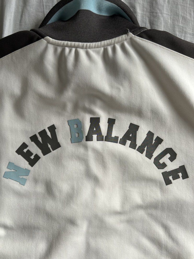 New Balance Blue and White Jacket (Category: Coats, Jackets and Outerwear) located in Manila. Submitted by morax14 (Listing ID 1428175518, Image 3). Description: Length: 25in Width: 19in Size: S-M Brand: New Balance Blue and White Full-Zip Jacket .